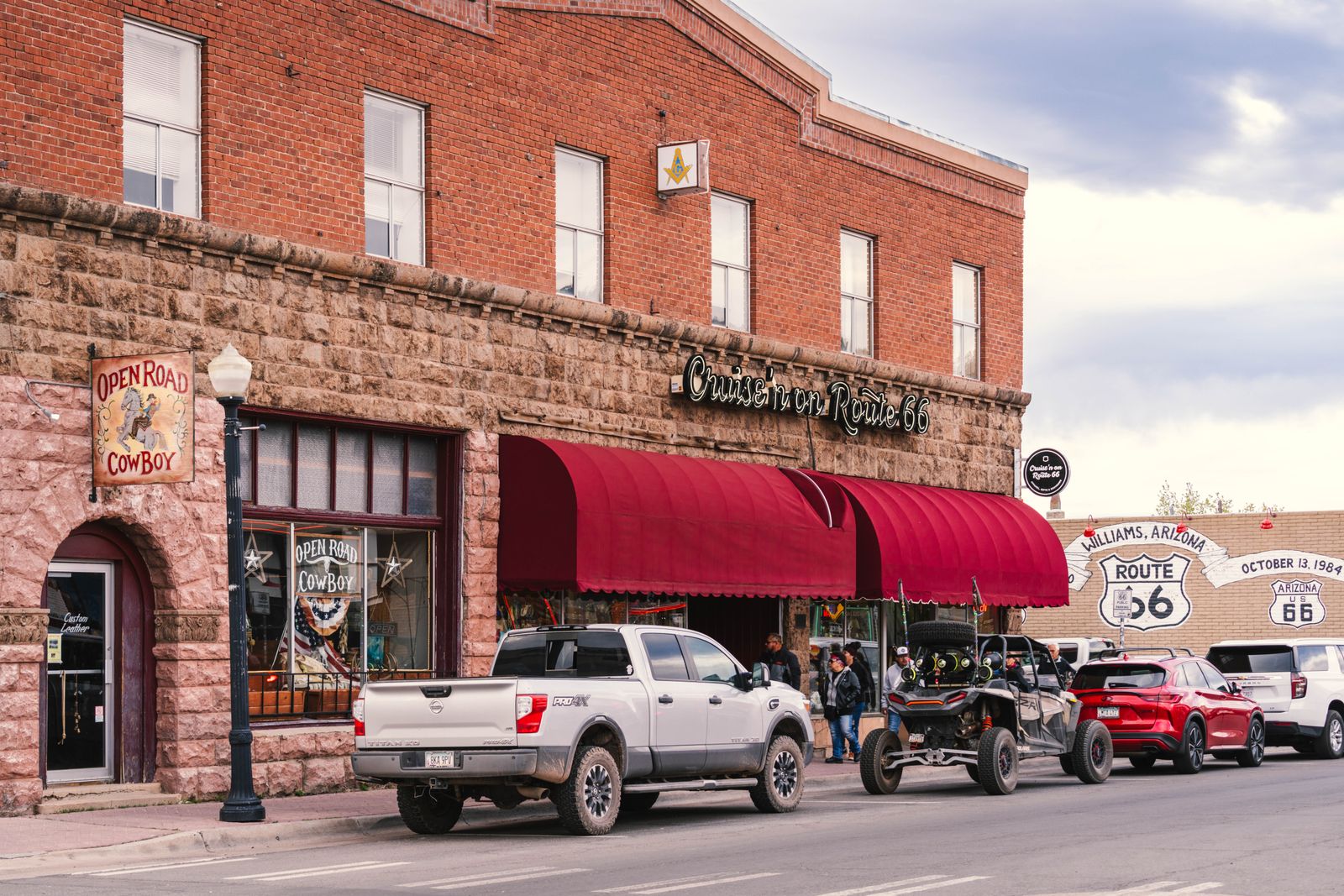 Brick storefronts and a diner along Route 66 in a small US town